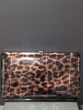 Modapelle Woman's Clutch Features A High Gloss Leopard Print Patent eather.